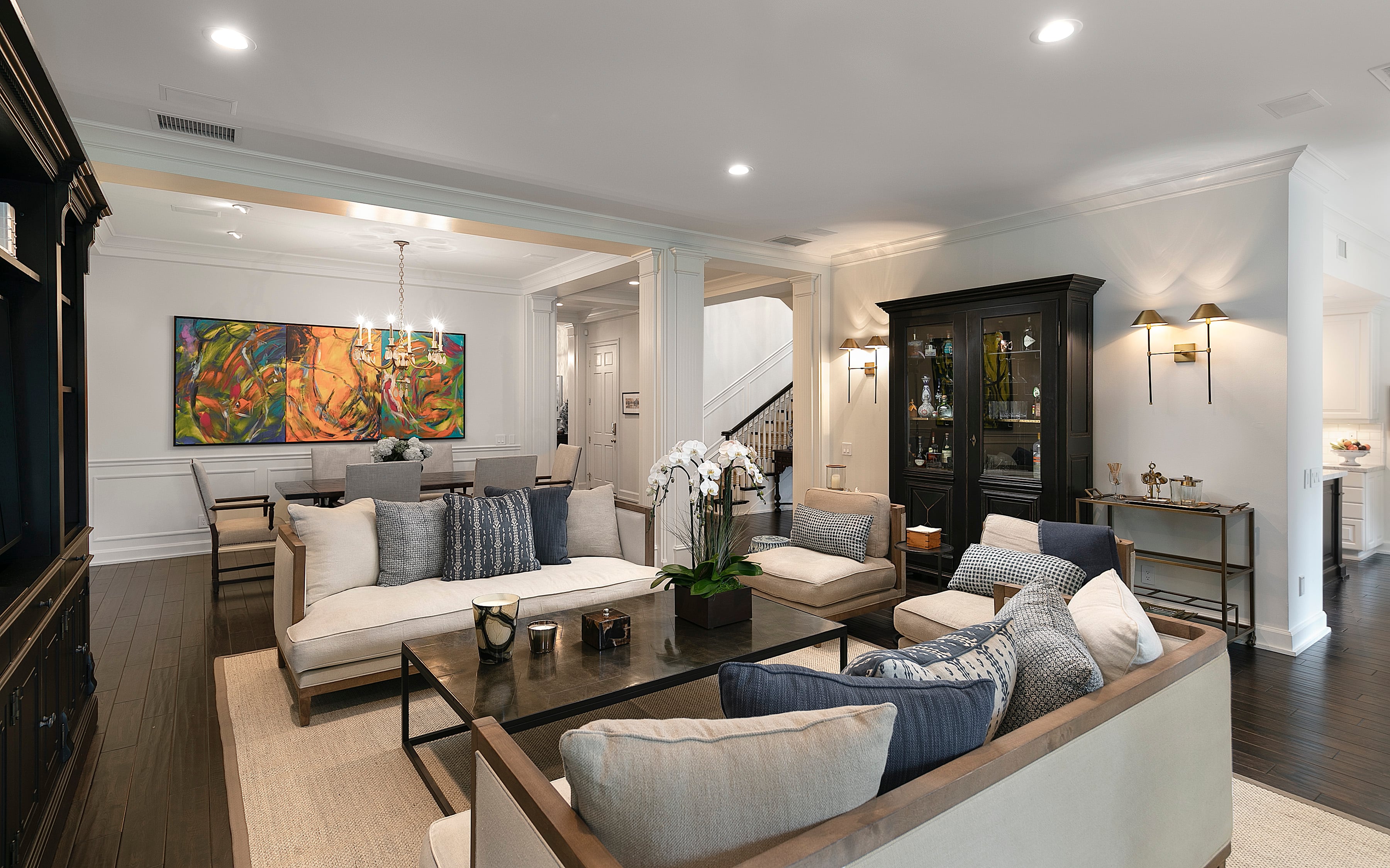 Elegantly staged living and dining room in a Misraje listing
